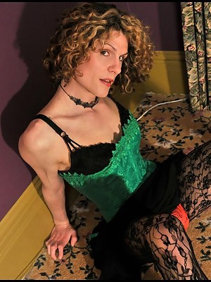 Sweet witchy crossdresserl in ebony lace pantyhose & poison green corset.